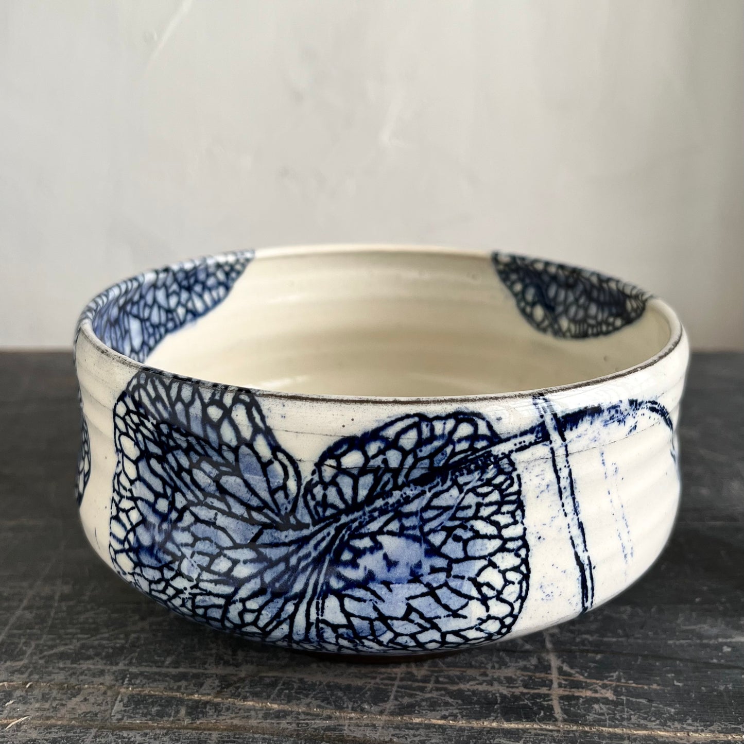 Handmade ceramic bowl, white with blue decorations