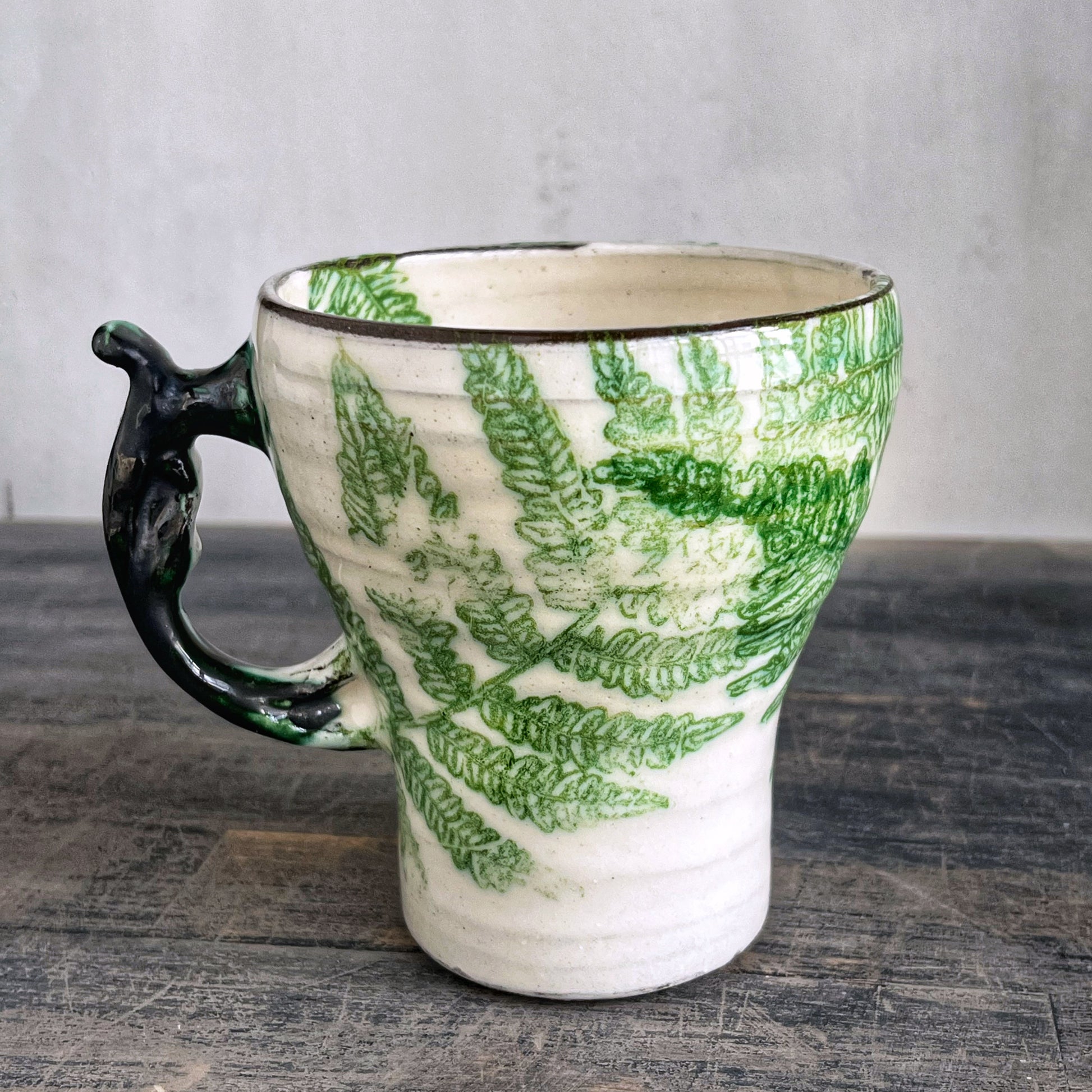Handmade ceramic cup, white with green details 