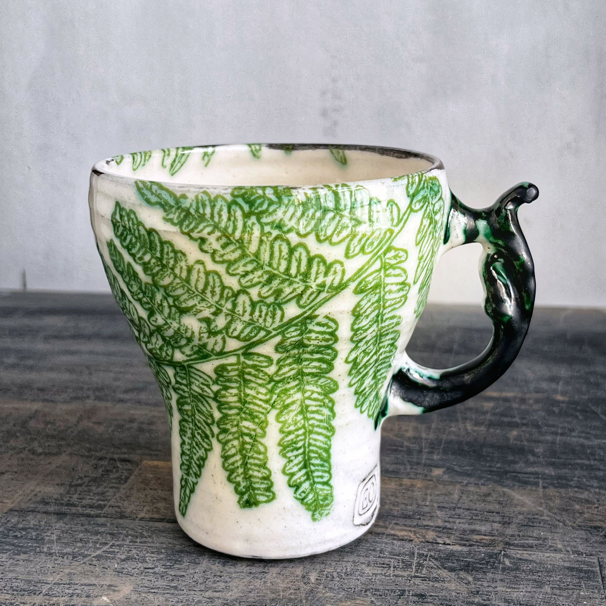 Handmade ceramic cup, white with green fern's 