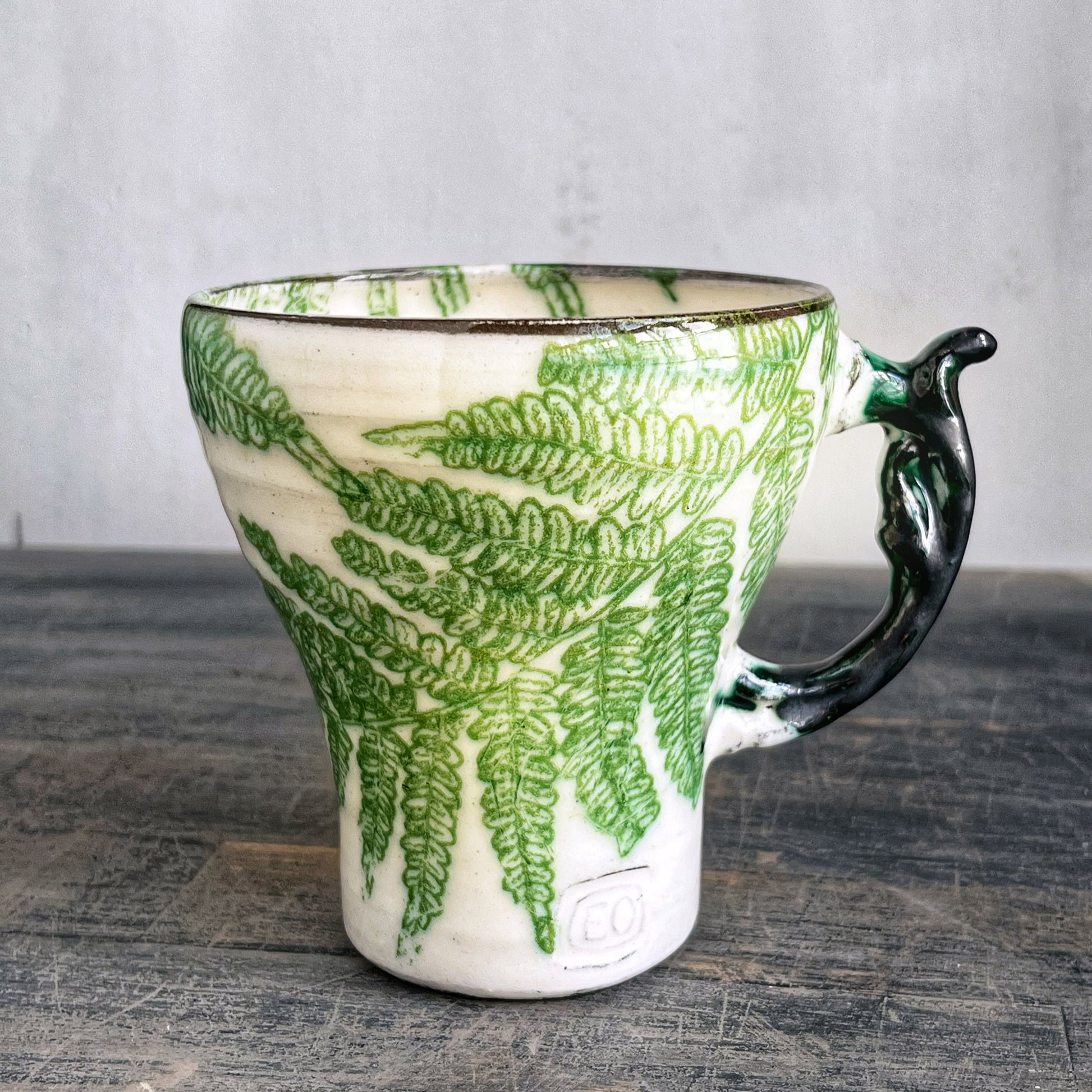 Wheel thrown ceramic cup, white with green ferns