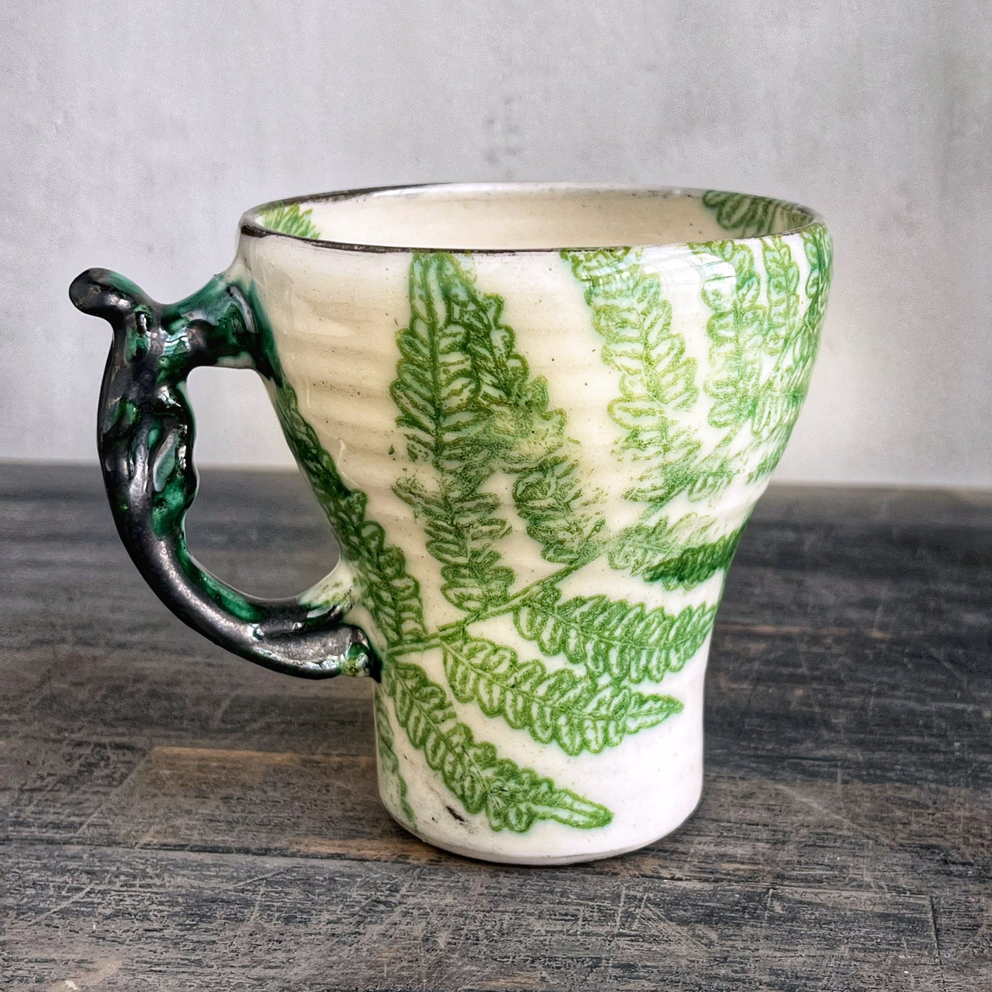 Handmade ceramic cup, white with green details 