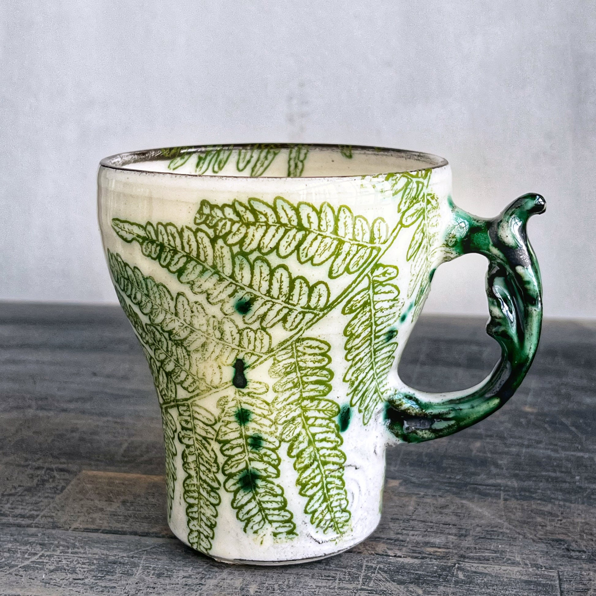 Handmade ceramic cup, white with green fern's 
