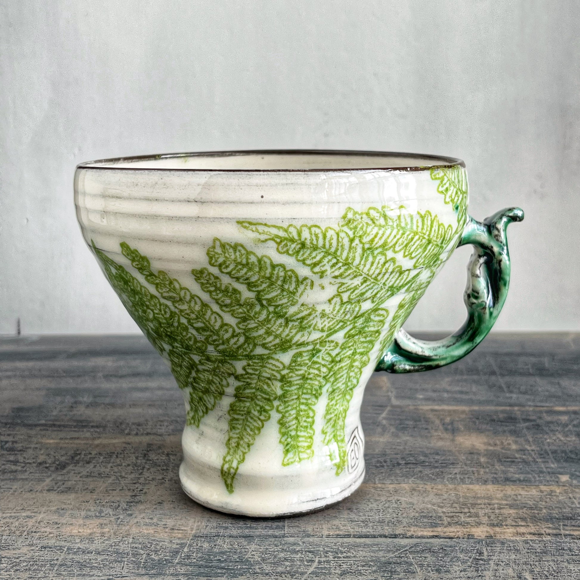 Wheel thrown ceramic mug, white with green ferns
