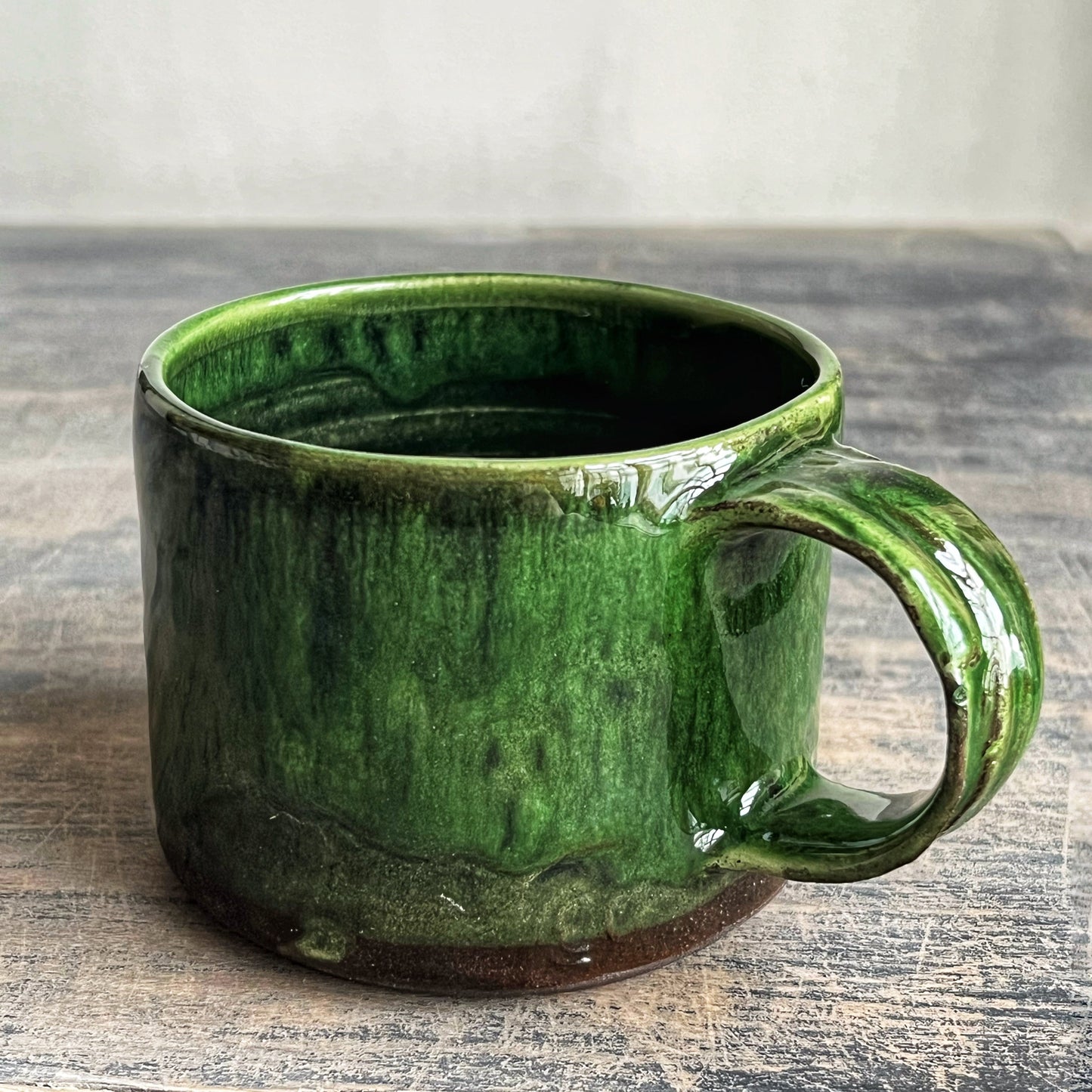 handmade ceramic coffee cup green