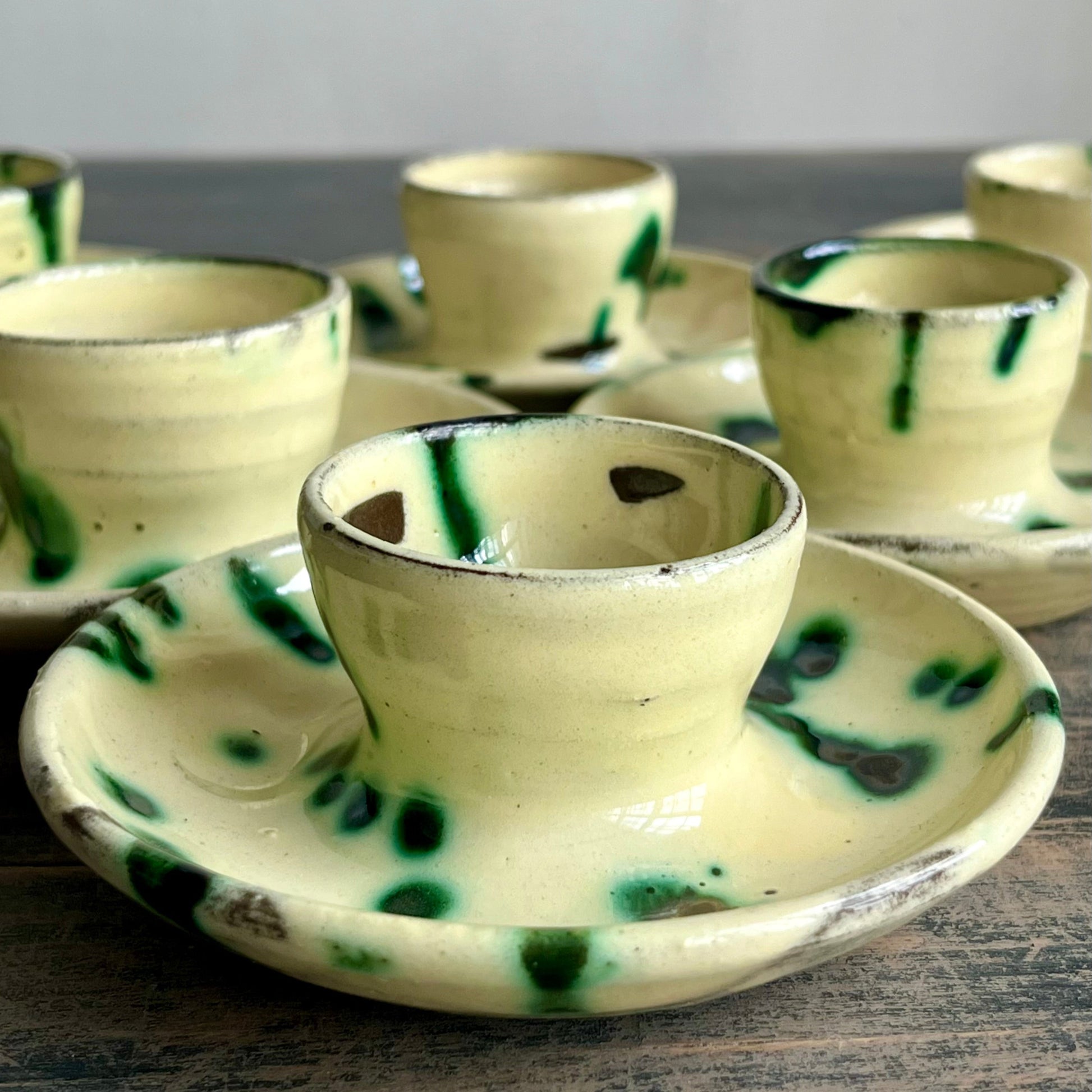 handmade ceramic egg cups yellow and green