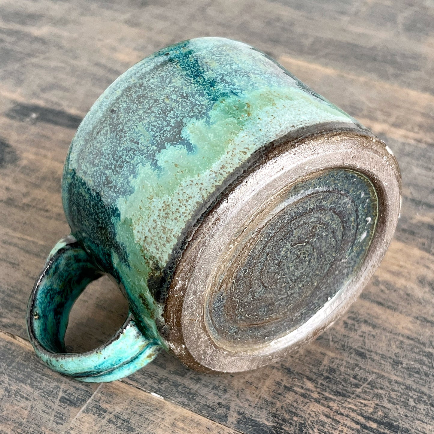 Handmade ceramic coffee cup bottom